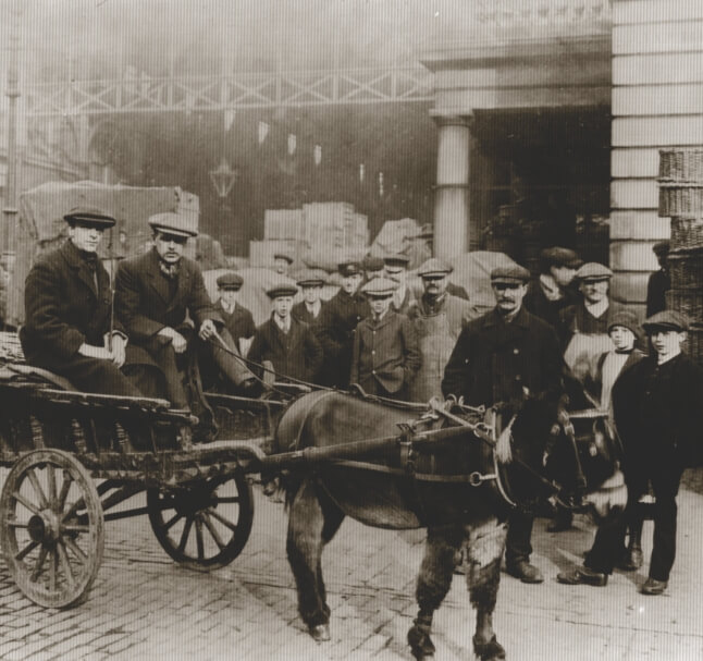 Old Sepia photo of a horse and cart