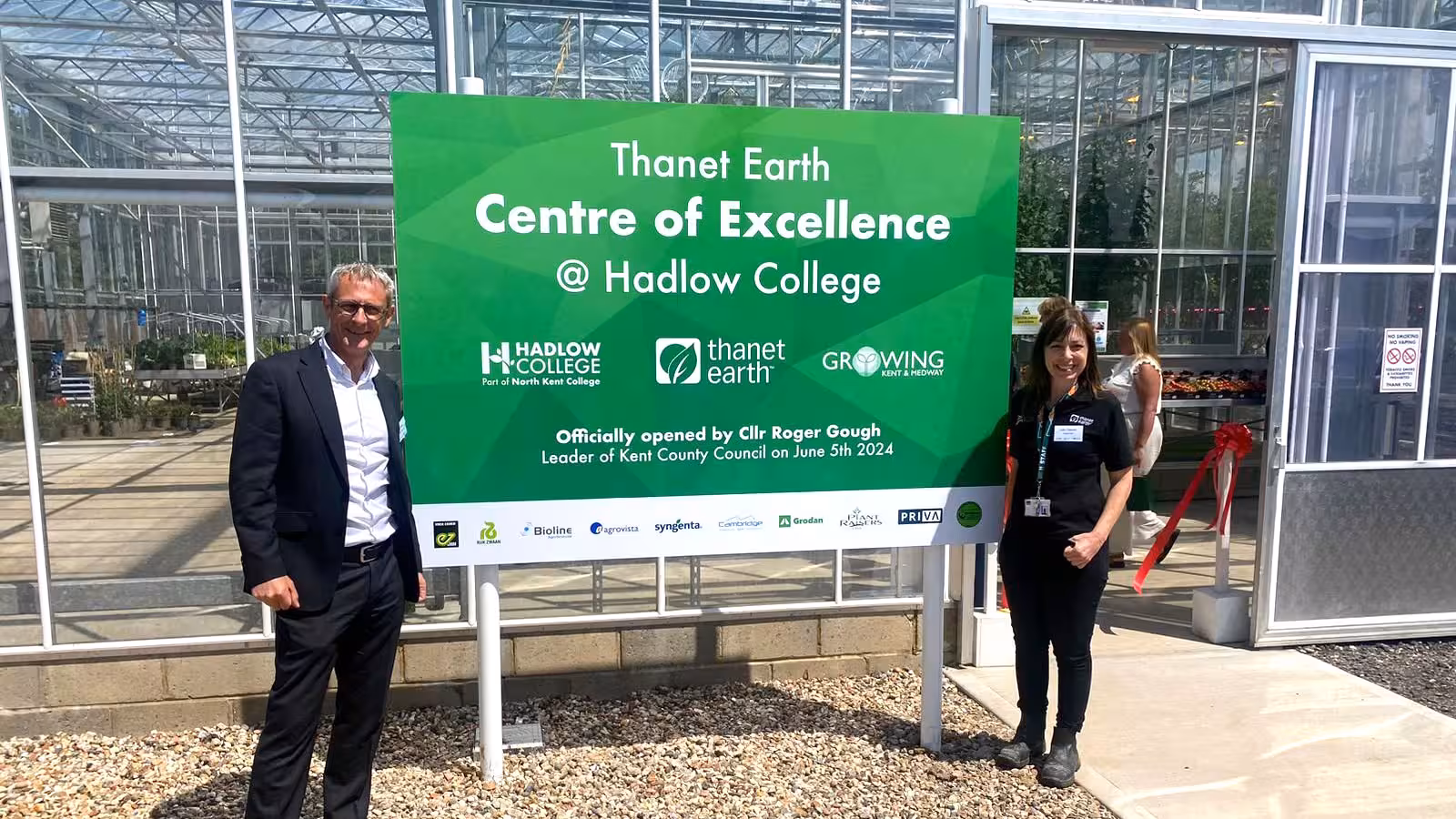 Robert James, technical director for Thanet Earth Standing next to the new centre of excellence sign at Thanet Earth